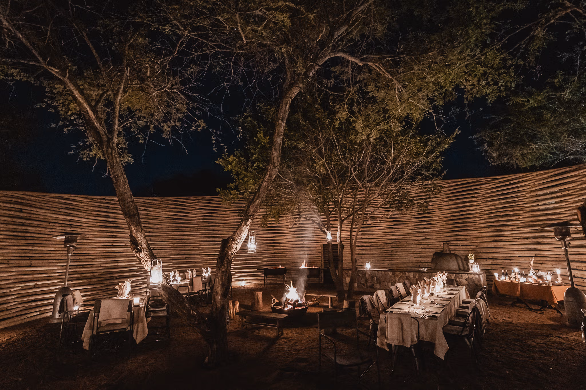 Boma dinner under the trees by firelight